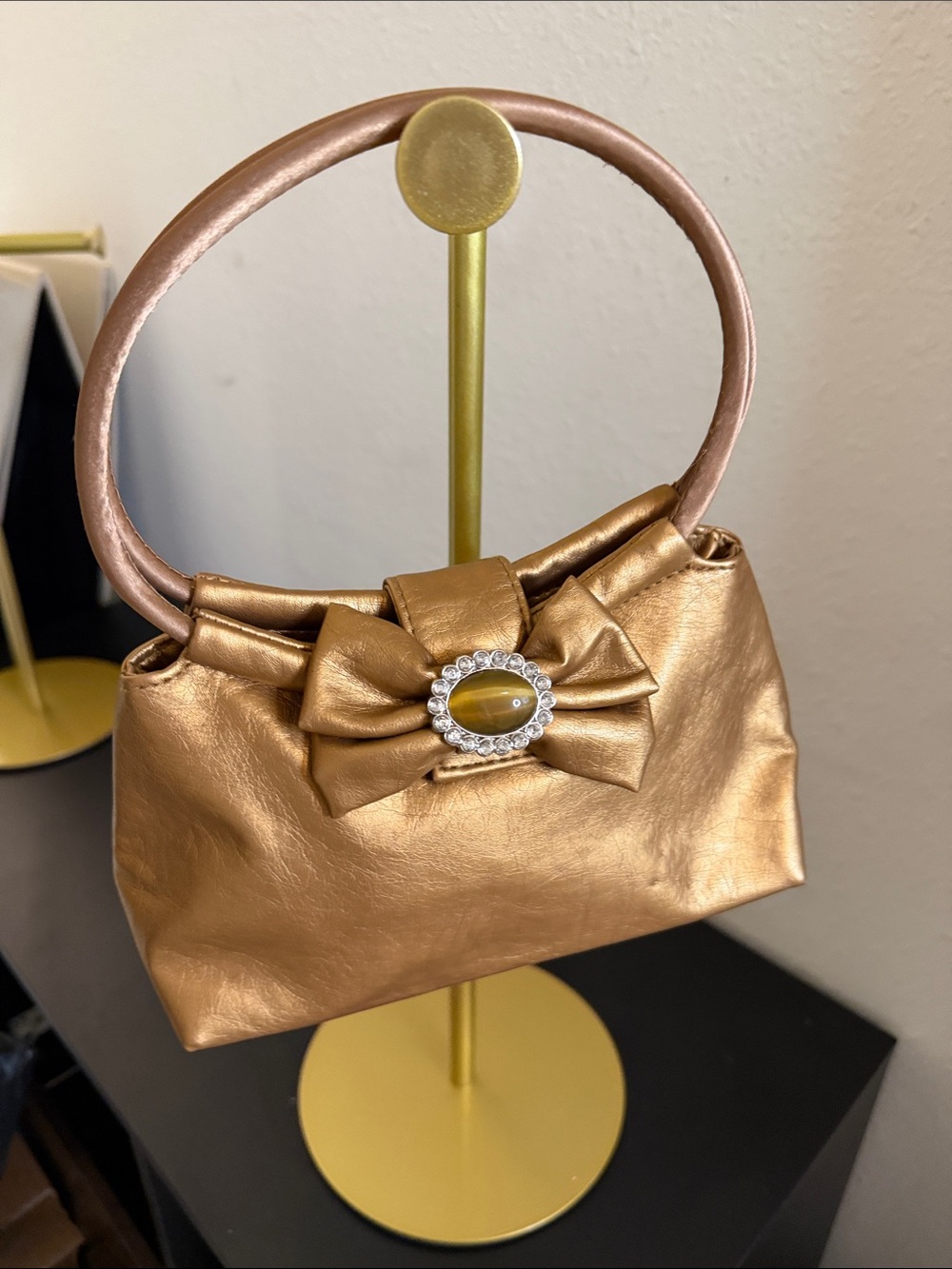 Elegant Metallic Gold Bow-Accent Women’s Handbag by Kichi USA